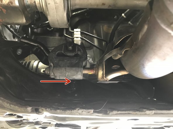 Apply a small amount of silicone spray to the end of the hanger rod