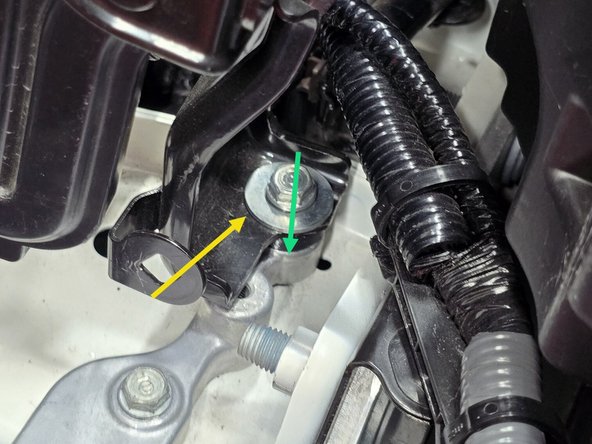 Move the ECU mounting bracket onto the spacer as shown