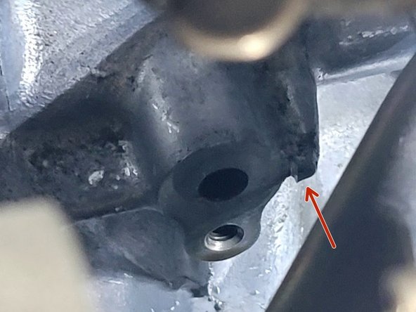 The small protrusion is critical and must align with the hole on the side of the oil feed block fitting