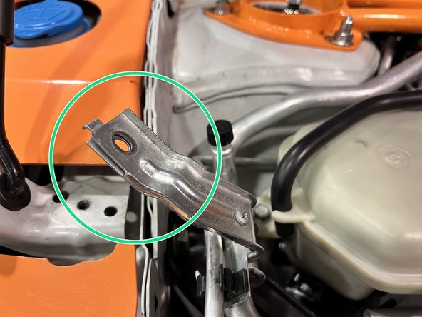 Rotate the bracket up and out of the way to give you some room to work