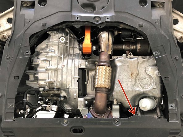 Locate the OEM hot side boost tube. It's in the general area of the red arrow connecting the intercooler and turbocharger