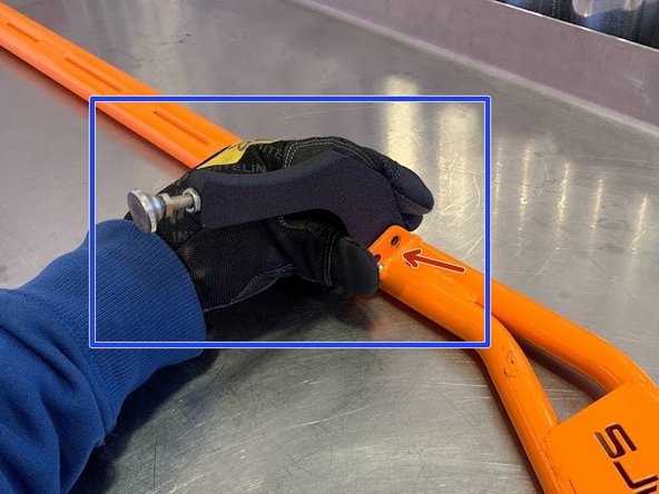 Place the FSTB on workbench upside down as shown and locate the mounting tabs