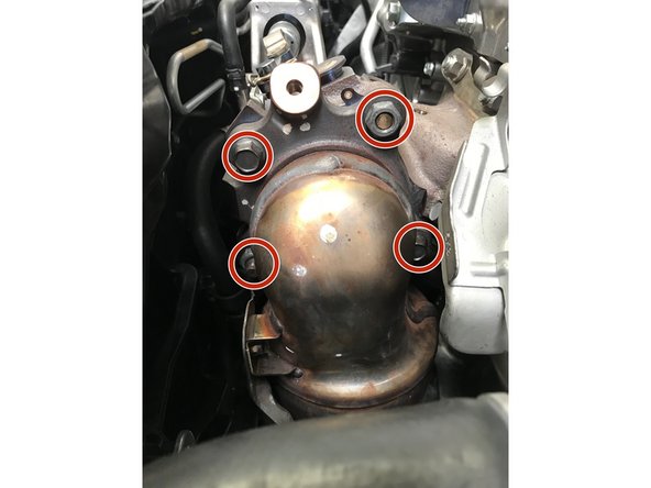 It may be necessary to spray the studs/bolts with a penetrating lubricant before removal.  Apply lubricant if needed and let sit for a few minutes then attempt removal