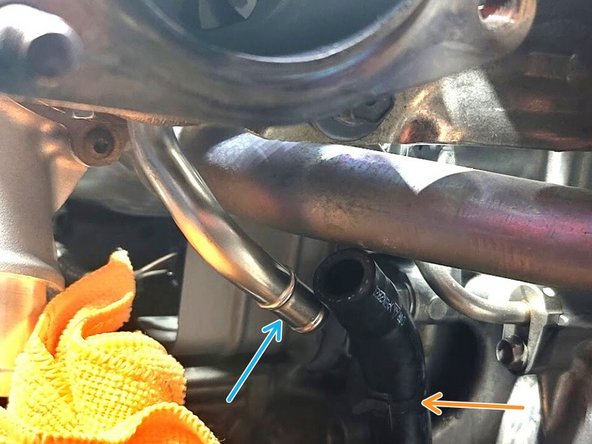 Slide rubber hose off hard line