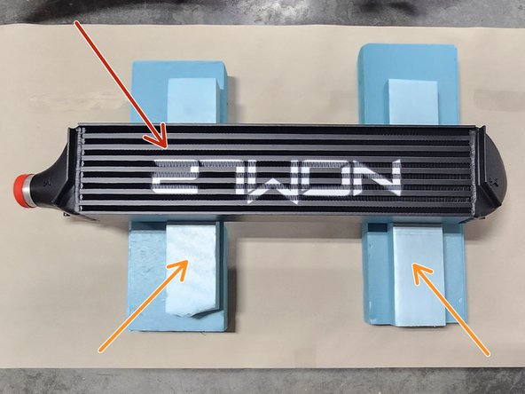 Once the intercooler has been removed from the Civic, place it on a clean work area as shown