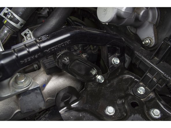 Remove the battery foam and tray case to reveal the battery bracket.