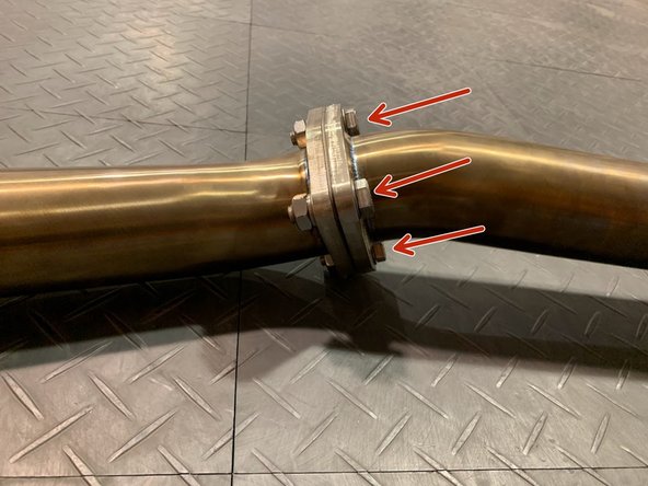 Install 3 sets of hardware as shown  using a 17mm socket and 17mm wrench. Hand tighten the hardware for now