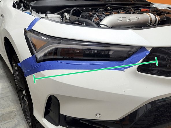 Place a strip of blue Painters tape on the each fender as shown