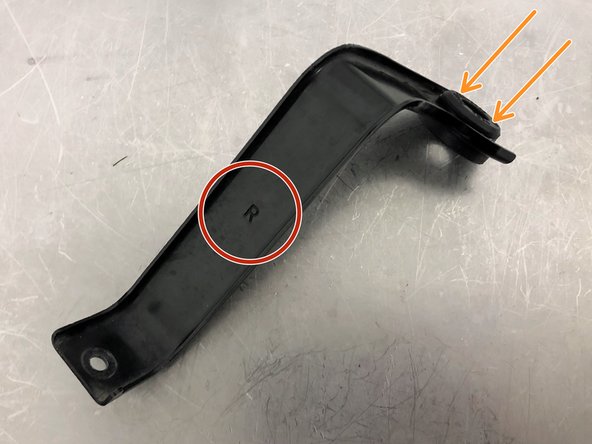 Locate the OEM hot side intercooler bracket. Look for the R stamped into the bracket