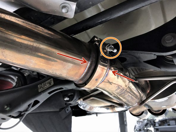 Following the v-band guidelines in step 21, loosely attach the rear mid-section to the muffler section using the v-band clamp as shown