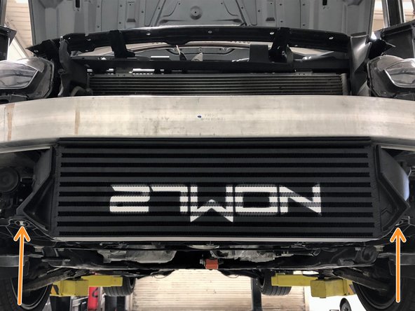 Tighten the two M10 bolts through the bottom OEM mounting grommets until snug using a 15mm socket and ratchet