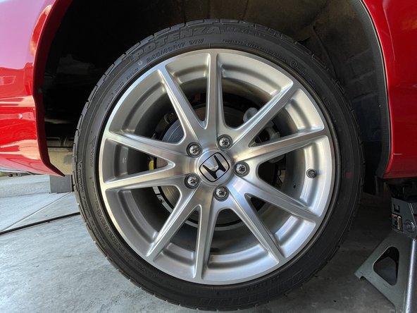 Raise the vehicle and support with jack stands in the OE recommended locations and remove the rear wheels/tires