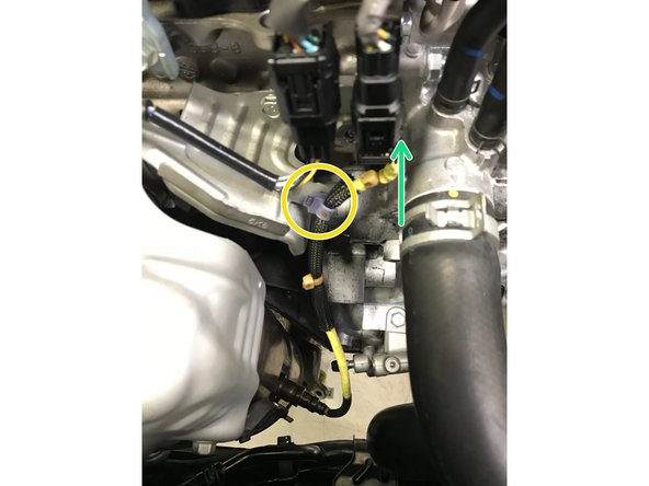 Connect the primary sensor to the wiring harness as indicated by orange arrow