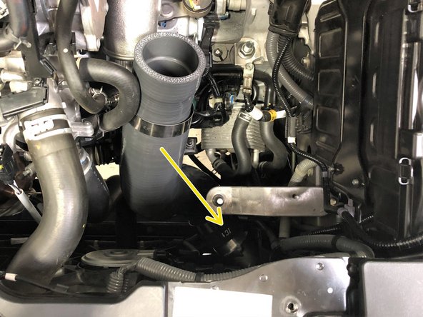 Install the two supplied 63-71mm clamps away from the ends of the silicone as shown