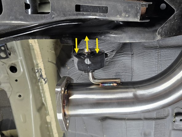 Reconnect the rubber hanger to the exhaust hanger