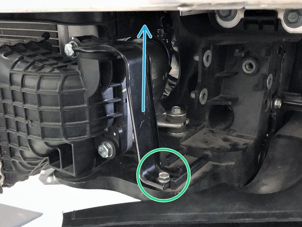 Lift the bracket free from the vehicle