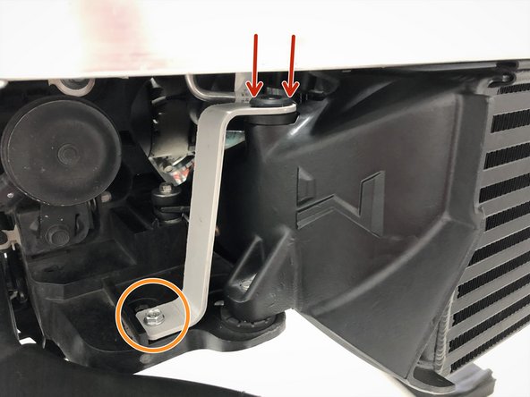 Install the 27WON hot side bracket onto the 27WON intercooler. The rubber grommet fits over the peg on the endtank