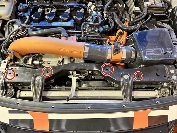 Locate the 4x 10mm holes shown in red circles. This is where we will install the supplied Riv Nuts