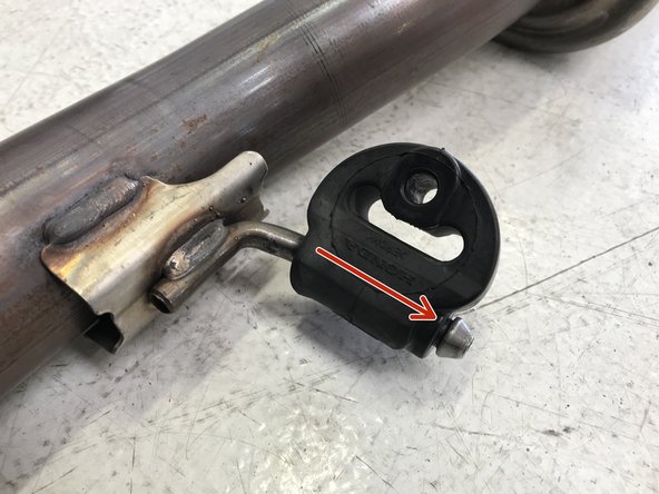Remove the rubber hanger from the OE exhaust