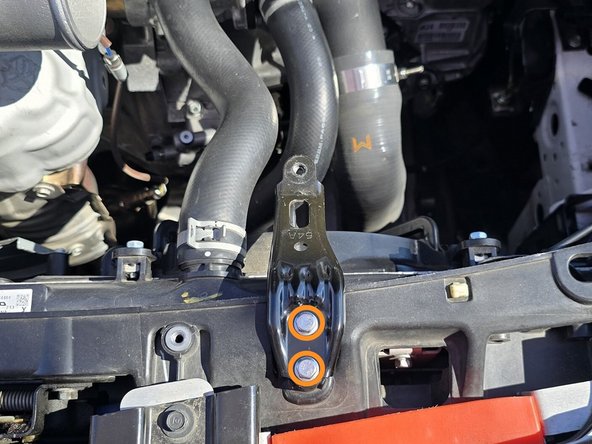 Use a 3/8&quot; drive ratchet and a 10mm socket to remove two (2) bolts that hold the intake bracket in place