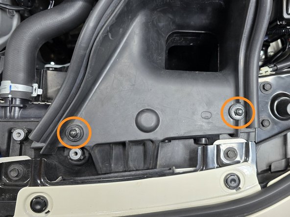 Use a 3/8&quot; drive ratchet and a 10mm socket to remove two (2) bolts that hold the intake duct in place