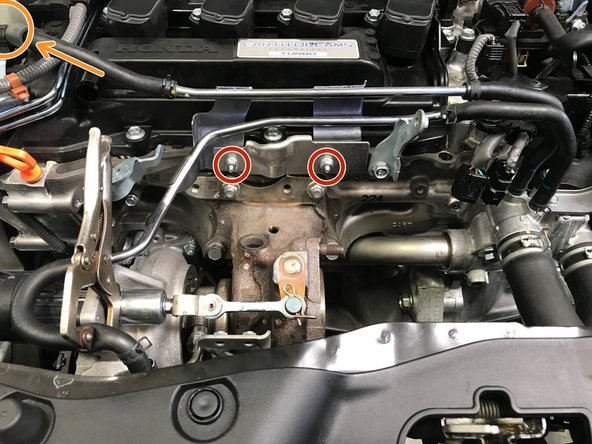 Use a 10mm socket &amp; ratchet to remove two (2) 10mm nuts holding the bracket