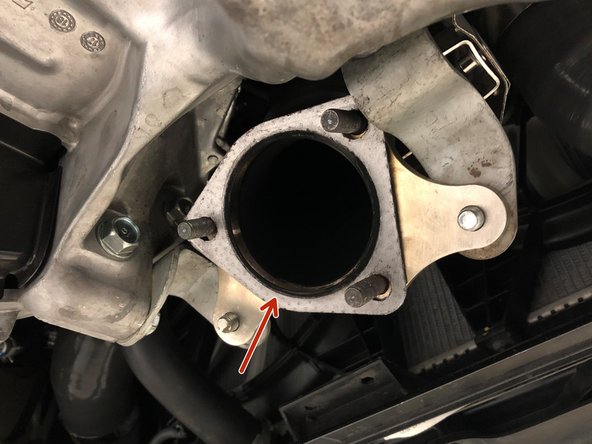 Locate and install the provided 80mm &quot;2 &amp; 1&quot; gasket onto the downpipe studs