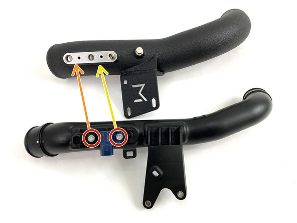 Remove the two (2) bolts holding the sensors using an 8mm socket and ratchet