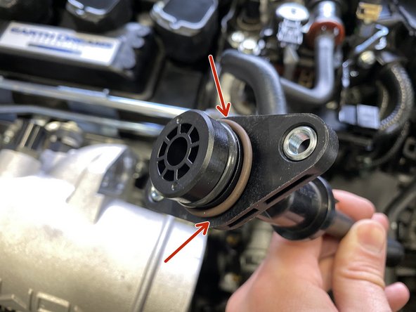 Install the provided brown o-ring over the EVAP valve as shown