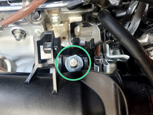 Wiggle OE TIP into position as shown