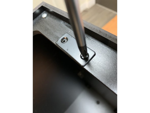 Using the M3x6mm wood screws, fasten the mag catches to the seal flange at the pre-drilled holes as shown here.  You will fasten two screws into each catch plate.