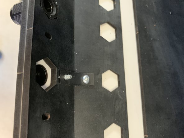 RepBoxes produced between late March and Mid-April 2021 may have come with a longer exit clamp strip on Sheet S. It is installed as follows but has since been replaced with our new printable Exit Clip stored in our public file repository here. We recommend printing one to replace the old strip design.