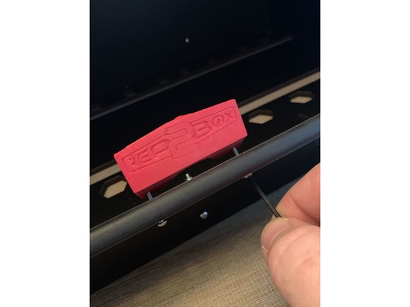 Attach the latch plate to the box with two 16mm screws as shown here.