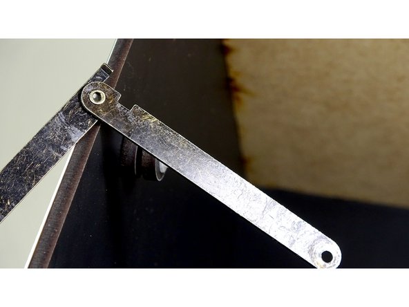 Put two laser cut spacers over the bolt, followed by a 3D Bushing.