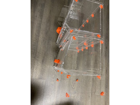 VERY CAREFULLY rotate your partial assembly with the one side and rear STAX panel on to the rear panel and then carefully onto the side panel you have already screwed on.