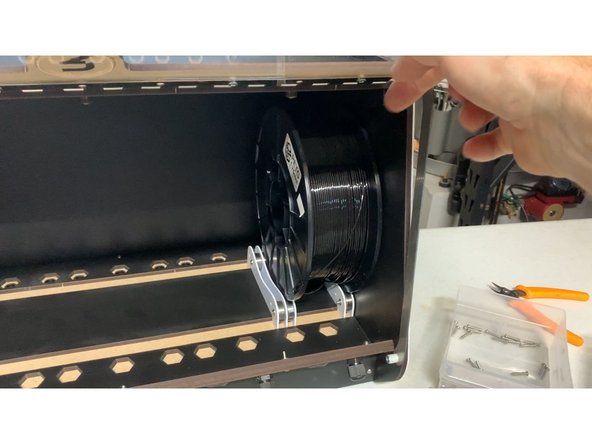 The rollers are designed to slide in the tracks on the inside of the RepBox so they can accommodate virtually any width of spool.