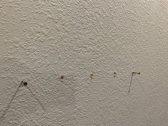 Set anchors and screws for each of the five mount holes as needed.