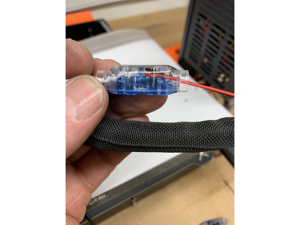 For the stock heater wire, again be sure that ONLY the red cloth jacket is stripped off and clear of the crimp. Only the white silicone jacket should be inside and compressed by the splice connector. Pic 1