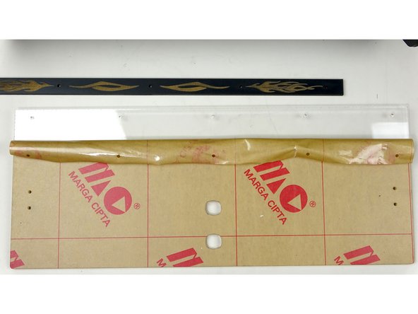 Leave the rest of the film on for now to protect the acrylic during install.