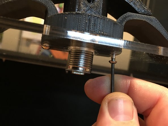 Rotate the cylinder of the lock so that the threads are on the top and bottom of the handle set.