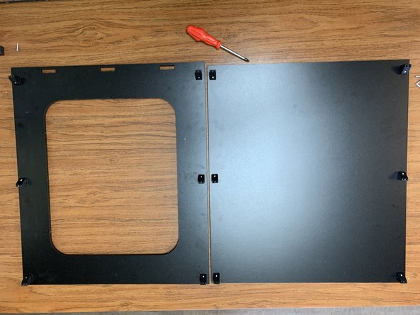 For each bracket, pass a 16mm TF screw through the hole in the top panel, and self-tap it into a bracket on the opposing side.  When properly installed, each bracket's double-hole side will point down towards the base.
