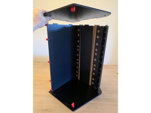 Place the other sidepanel atop the assembly as shown in these pics.