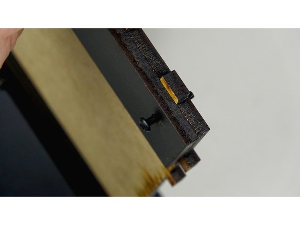 Check to make sure you have the Rear Track Guide on correctly. It should be on the unfinished side of the base panel, with its own finished side facing up. So they should be unfinished side against unfinished side.