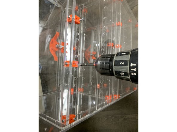 Rotate the stacked boxes so you can access the rear. Its now time to attach the rear STAX panel.