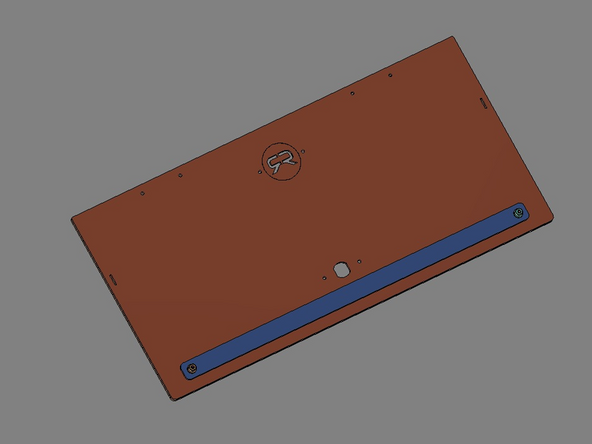 To simplify the assembly, lay the Face Plate on a flat surface (with the engraved lines facing upward). Peel the protective backing from the Dome Label. Align the label with the engraved marks on the Face Plate (the label will cover all of these lines). Press the label firmly onto the Faceplate.