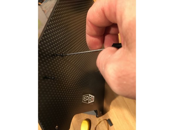 Lay your steel side panels over top the unfinished side of your MDF side panels and line up the holes