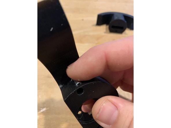 To fasten simply place two Rivnuts on either side of the handle and press into place as shown.