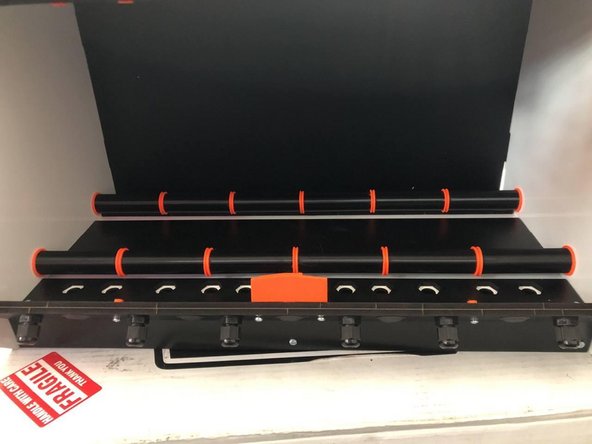 If you have version 2.3 the "Parts Pack R" the "RollerSet wiht the Roller Flange from Parts Pack F will replace these steps. Just insert the flange inbetween printed tubes.
