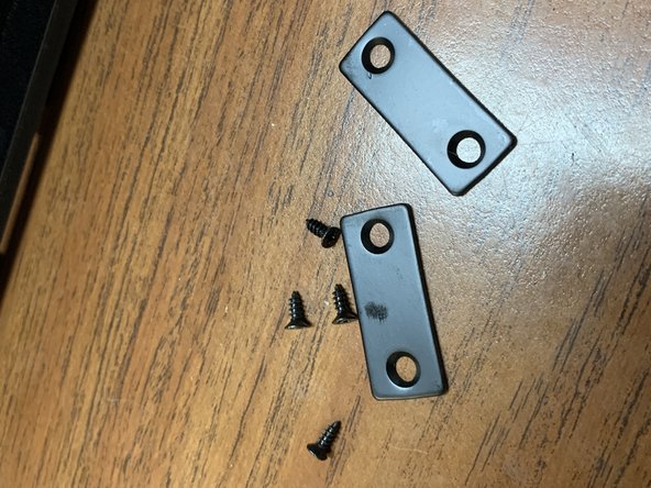 Select four of the M3x6mm wood screws from the parts pack.