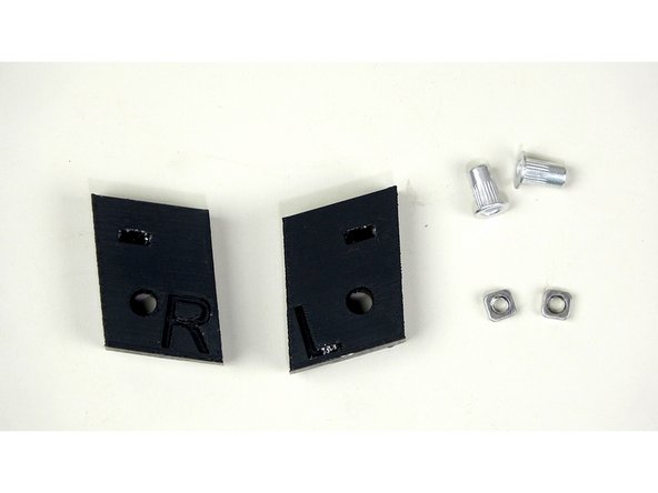 Insert a rivnut and square nut into each bracket. Both should be inserted into the side of the brackets with the embossed letters.